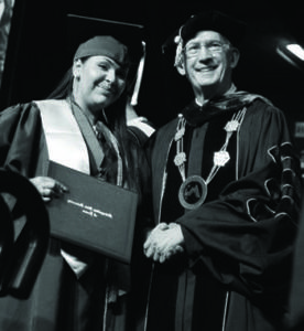 President Jordan Congratulates an MSU Denver Student Graduation