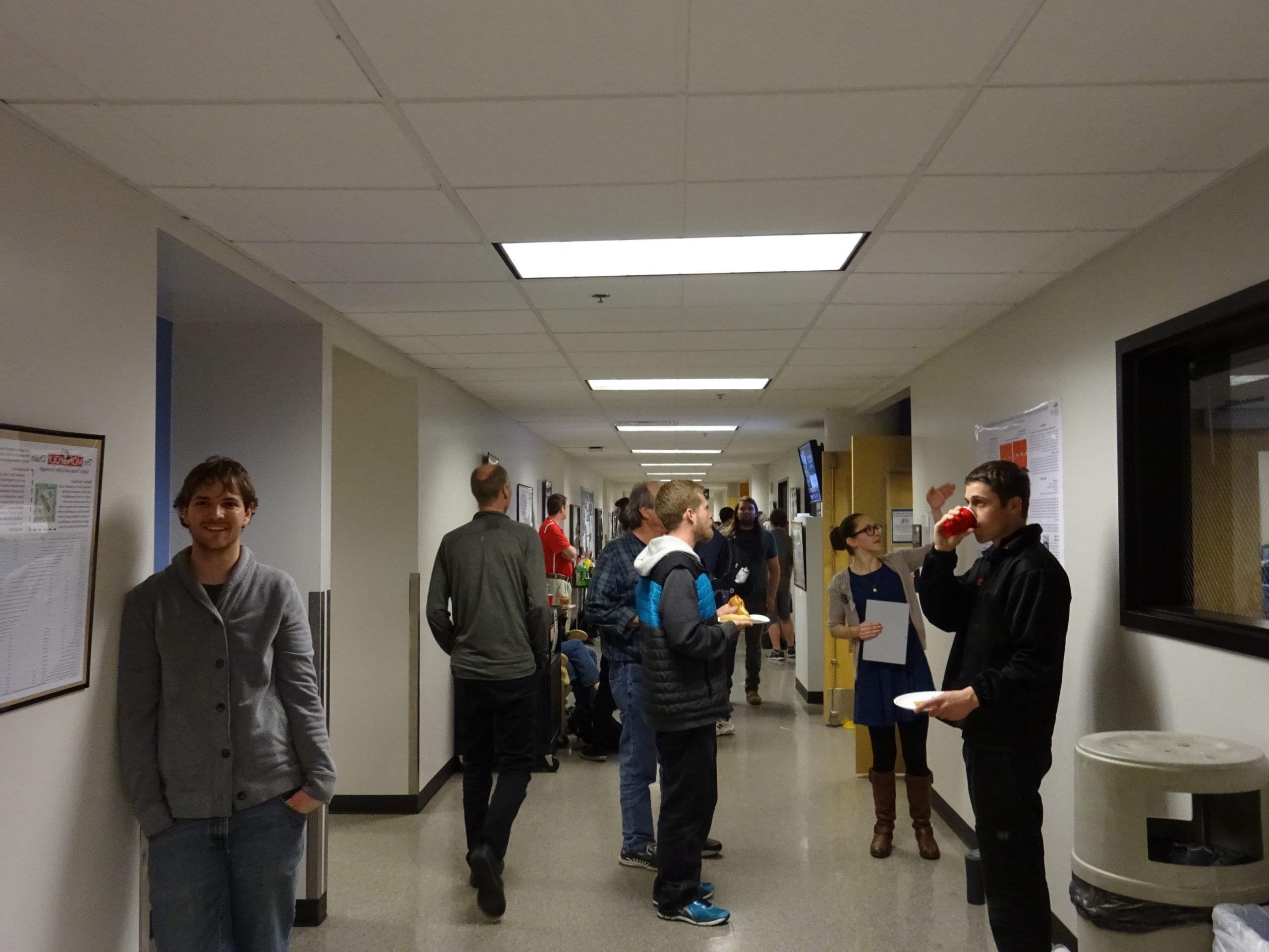 Students standing in the hallway in the Science Building